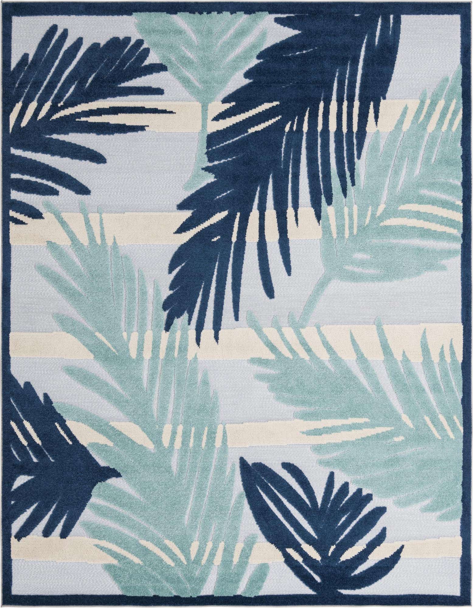 An 8x10 rectangular rug with a modern tropical pattern featuring large navy blue and light blue palm leaves over a striped gray and cream background.