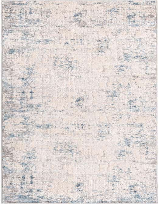 A 10 ft runner rug in a modern abstract pattern with distressed blues, grays, and creams, ideal for a hallway.
