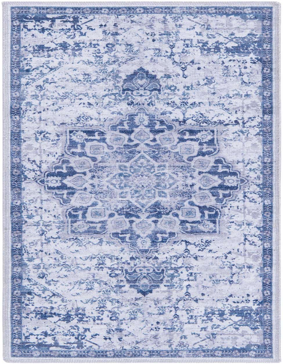 A 4 ft runner rug in blues and grays featuring a distressed traditional medallion pattern, ideal for a hallway.