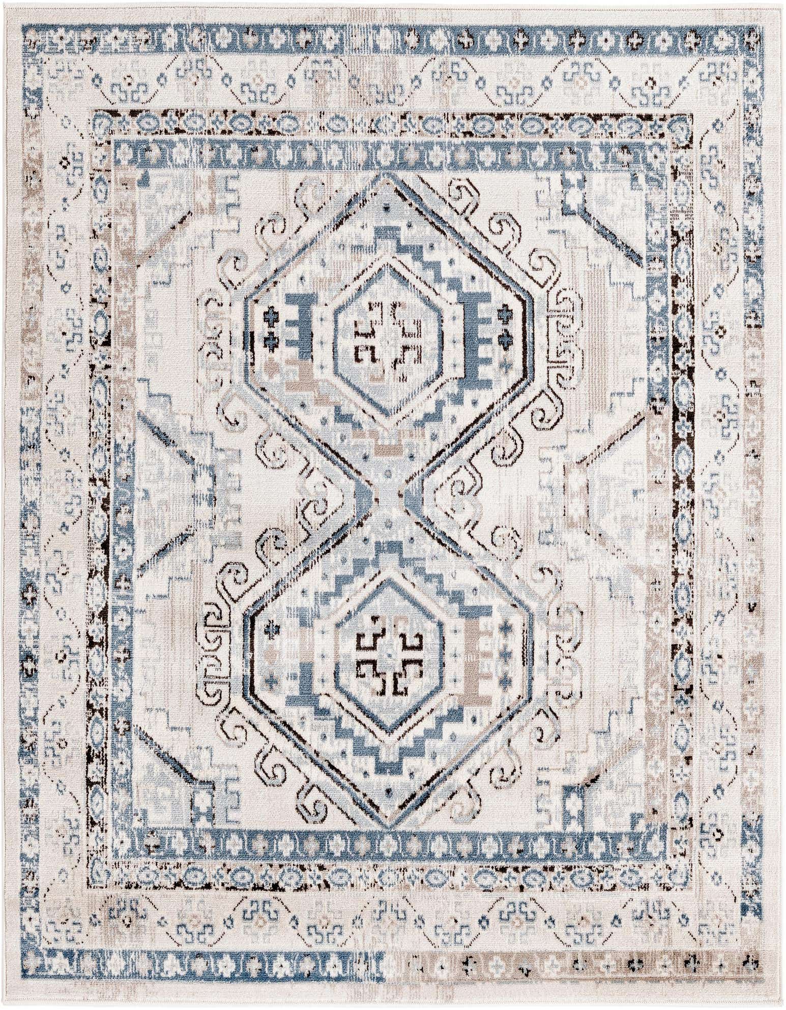 A 5' 3 x 5' 3 square Charlotte rug featuring a faded traditional tribal pattern in blues, grays, and creams.