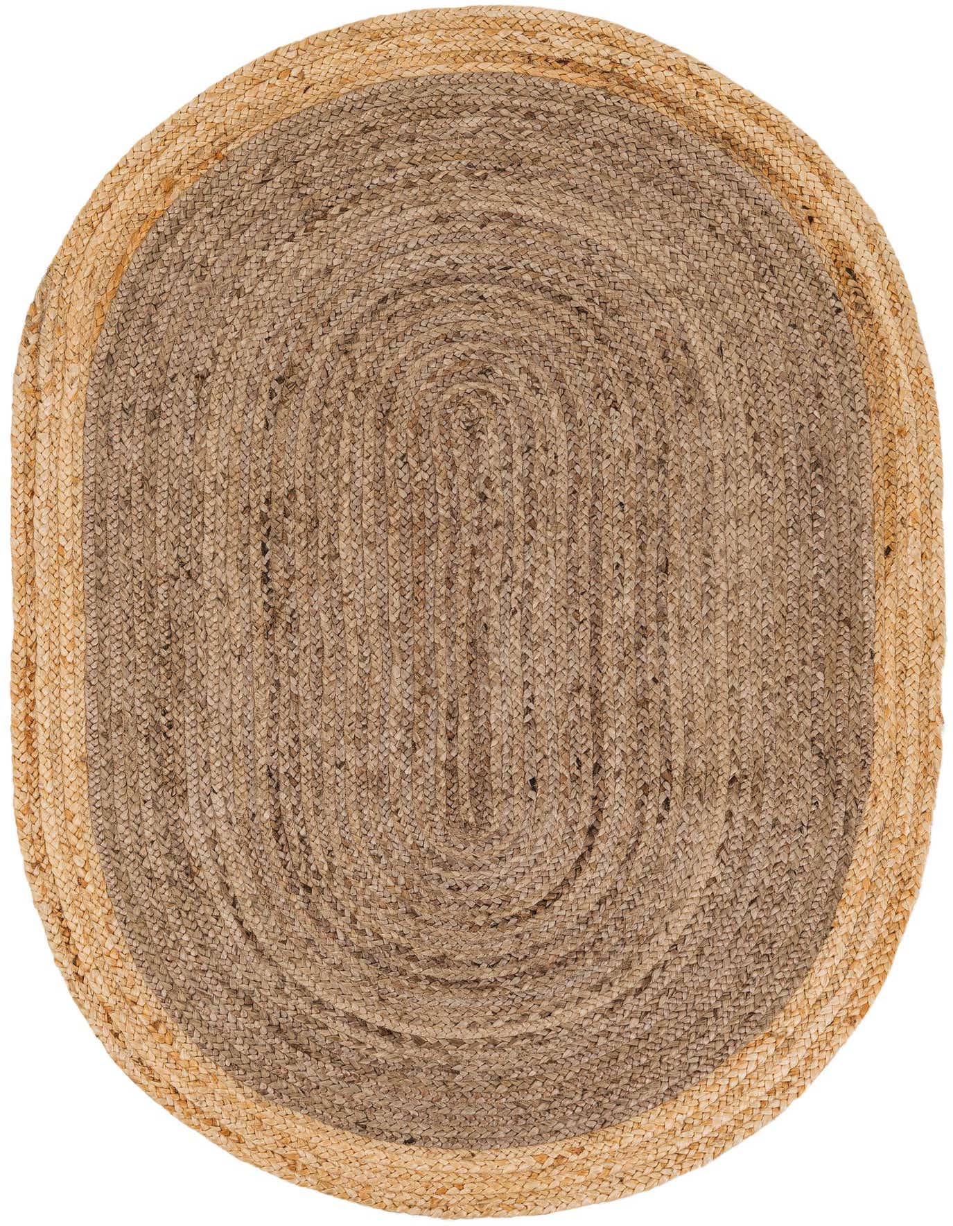 A 4'1" x 6'1" oval Braided Jute rug by Rugs.com, featuring a natural brown and tan braided design with a lighter tan border, perfect for an indoor setting.