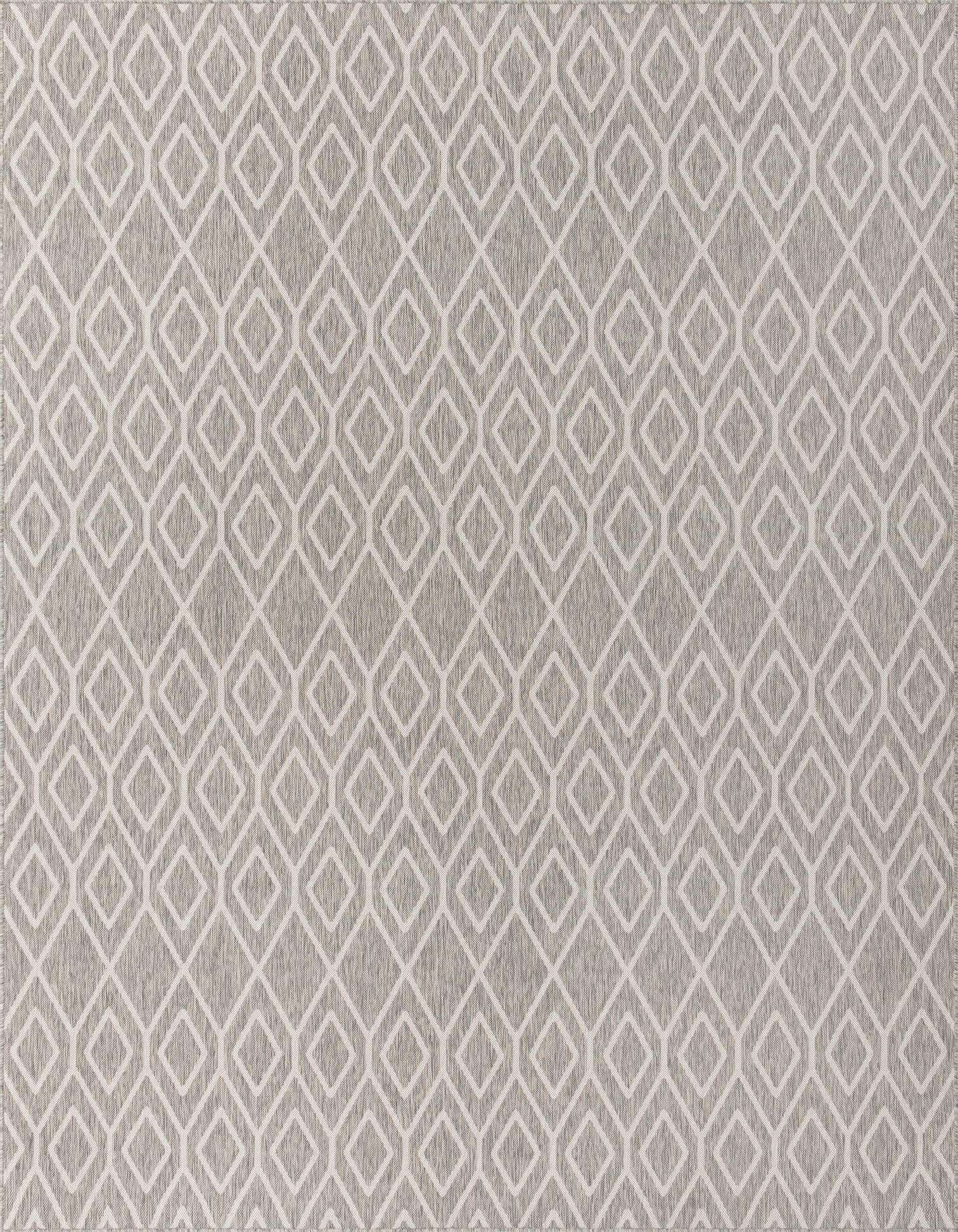 A 9x12 rectangular Jill Zarin Outdoor rug featuring an ivory trellis pattern on a gray background, suitable for indoor or outdoor spaces.