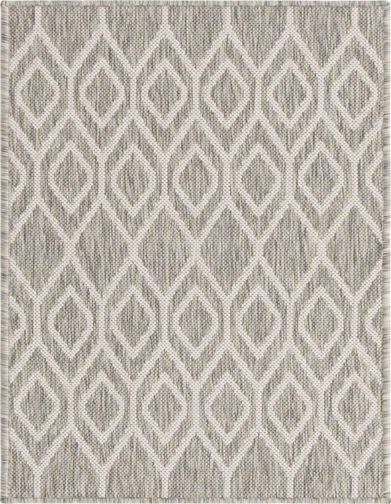 A 2x3 rectangular Jill Zarin Outdoor rug featuring an ivory and gray tribal trellis pattern with a textured flatweave.