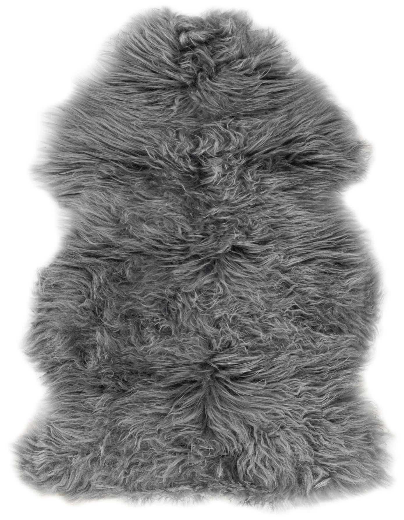 A plush, freeform gray lambskin rug with a medium pile, perfect for adding warmth and texture to any indoor space.