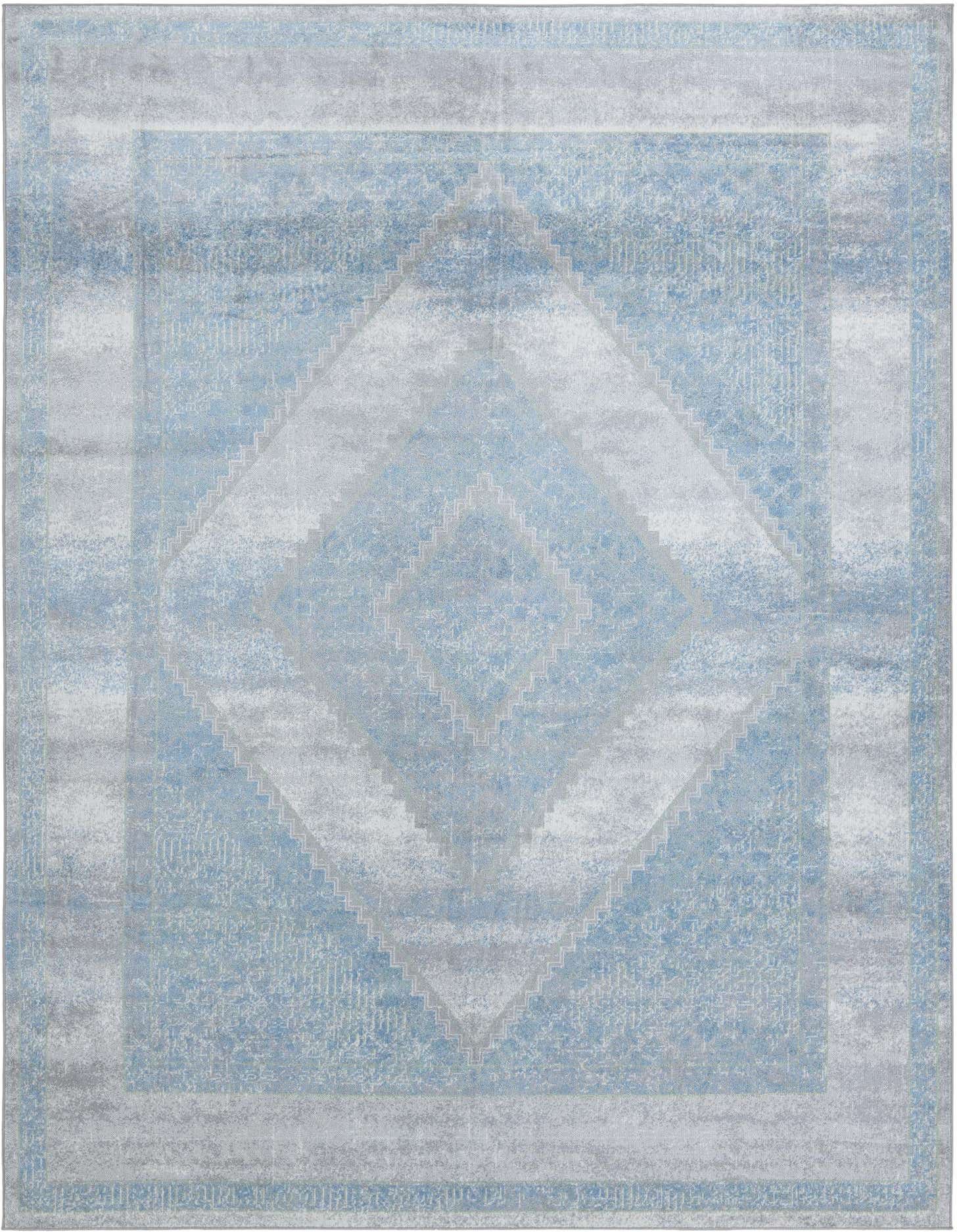 A 9x12 rectangular Kamala Washable rug featuring a distressed traditional medallion pattern in shades of gray and light blue.