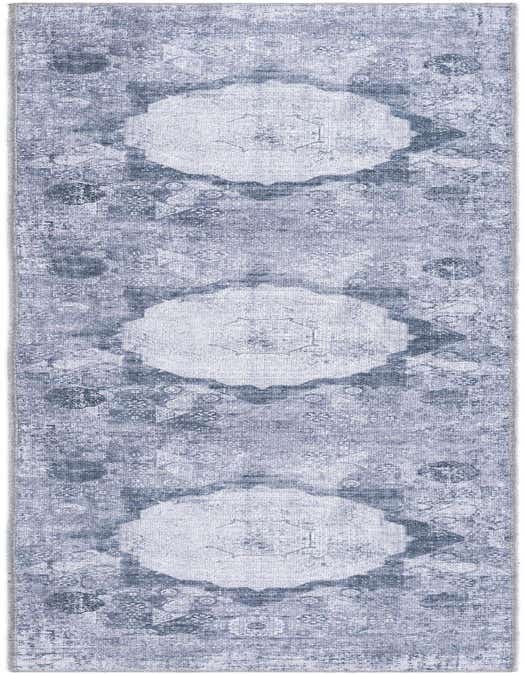 An 8 ft runner rug in shades of ivory, cream, and gray, featuring a distressed traditional medallion pattern, ideal for a hallway or kitchen.