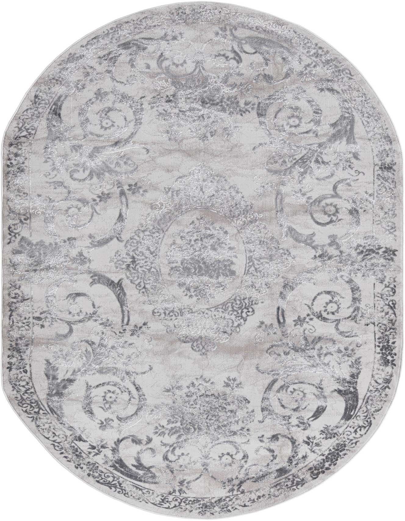 An oval 5'3" x 8'0" gray and silver traditional rug with an intricate medallion and floral pattern.