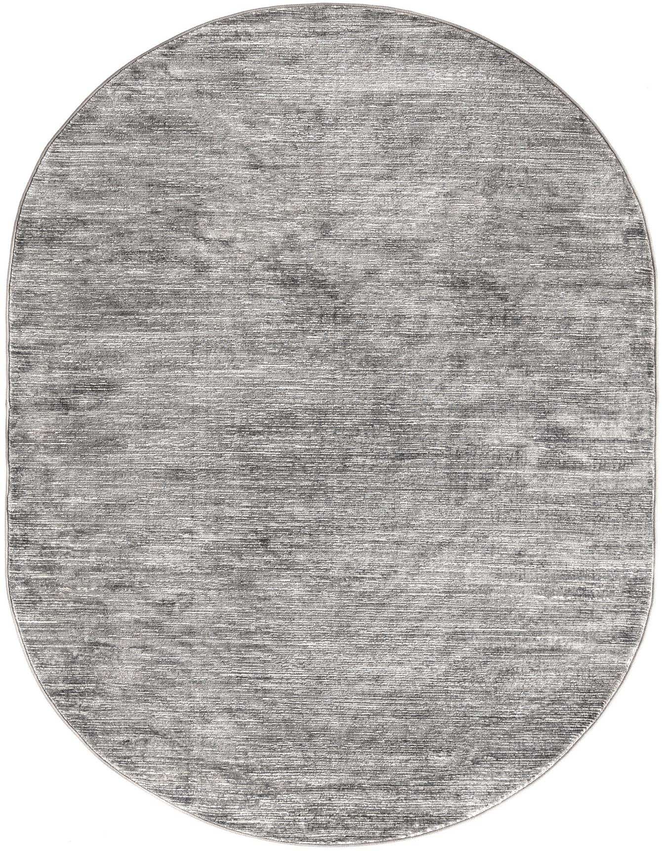 A 5'3" x 8'0" oval gray area rug with a subtle textured, high-low pile, suitable for modern indoor spaces.