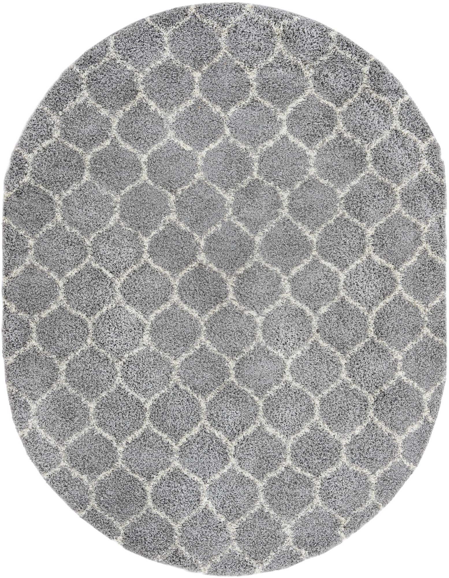 Oval gray shag rug with a subtle white lattice pattern, showcasing its plush texture and modern design.