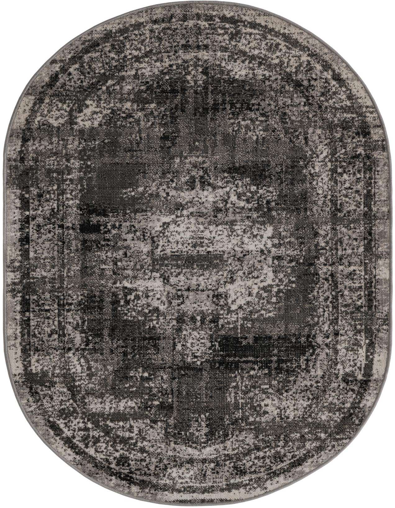A 3' 3 x 5' 3 oval gray polypropylene rug with a distressed, abstract pattern, suitable for indoor use.