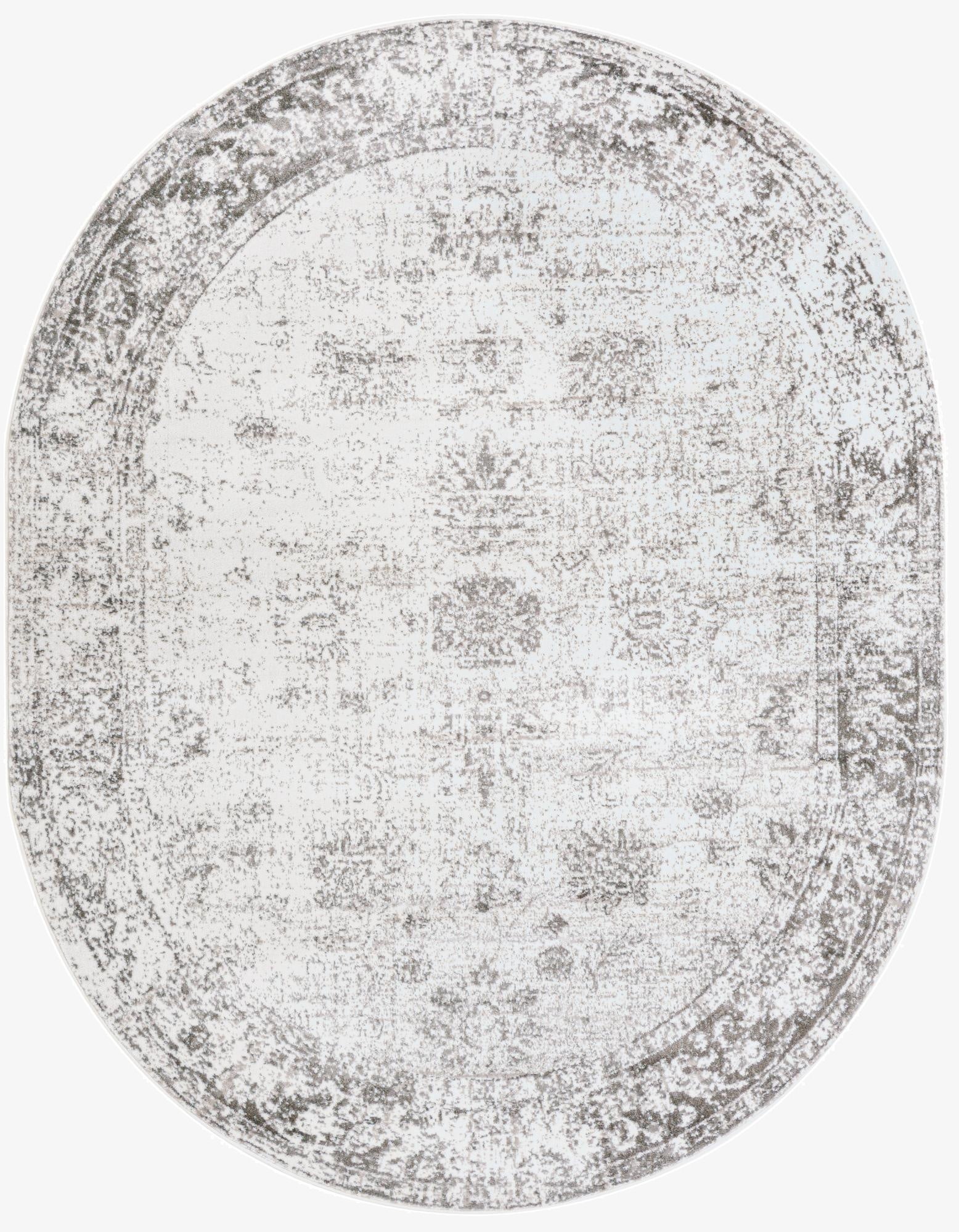 An oval 7' 10 x 10' 0 gray and silver Bohemian rug with a distressed medallion pattern.