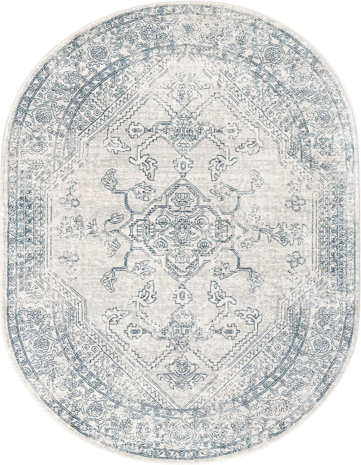 A 4'x6' oval gray and silver traditional rug with a distressed medallion and tribal border pattern.