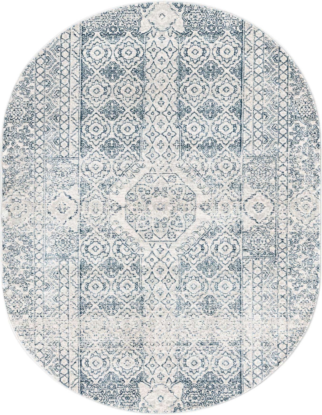 A 4'x6' oval gray and silver area rug with a faded traditional medallion and tribal pattern.
