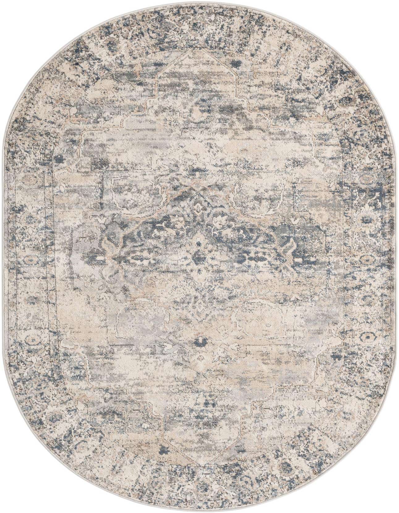 An oval 5'3" x 8'0" Oregon Collection rug by Rugs.com featuring a distressed medallion pattern in grays and silvers.