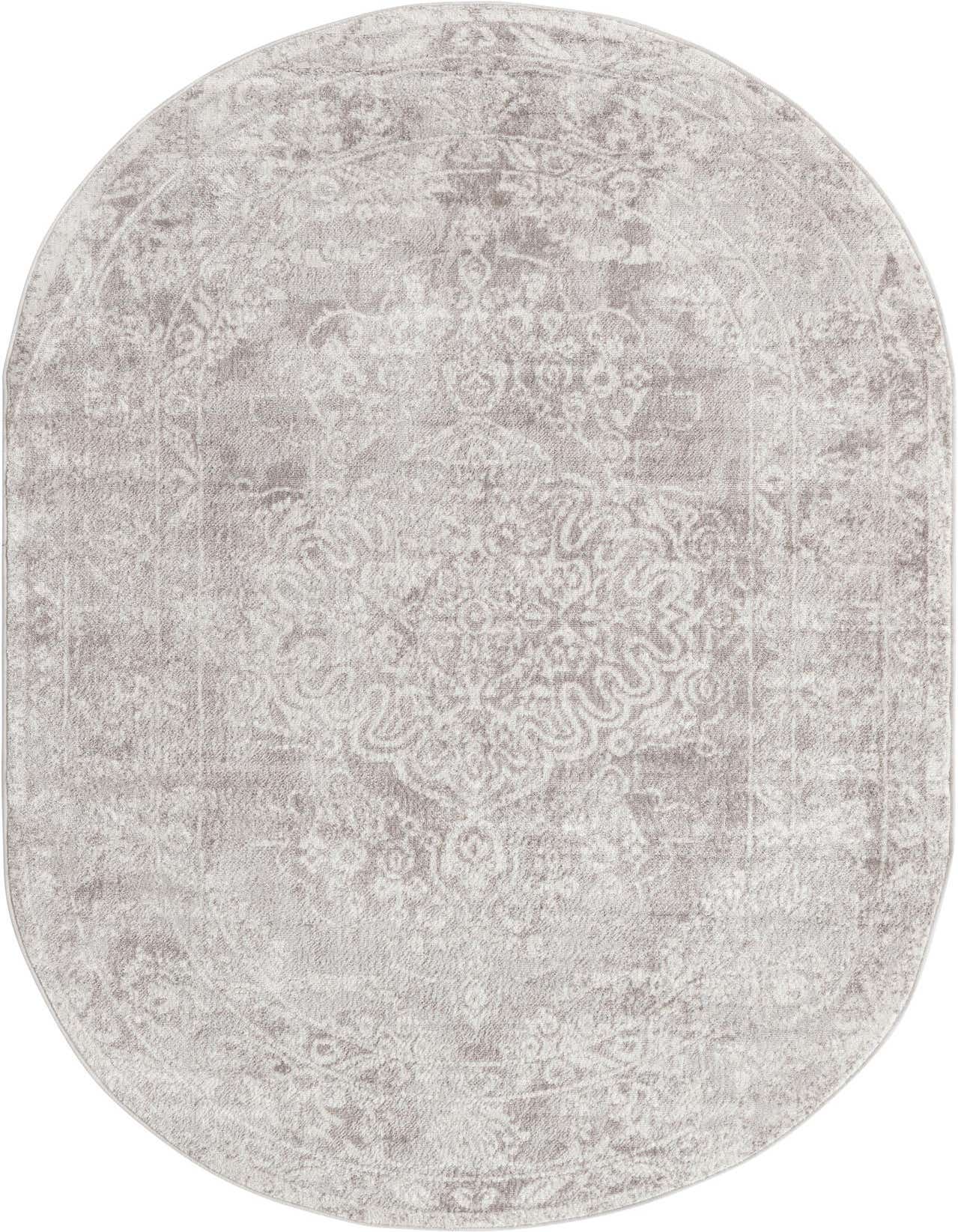 A 5'3" x 8'0" oval gray area rug with a faded traditional medallion pattern, ideal for an indoor living space.