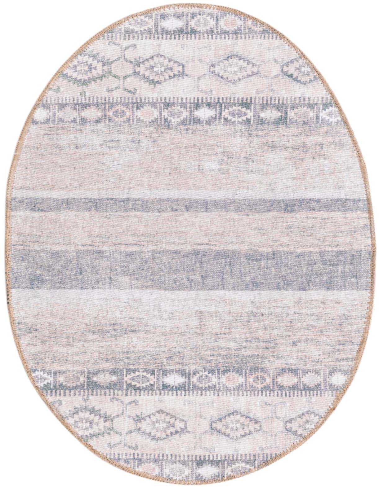 An oval Rugs.com Timeless rug featuring gray, silver, and blush tones with tribal and striped patterns.
