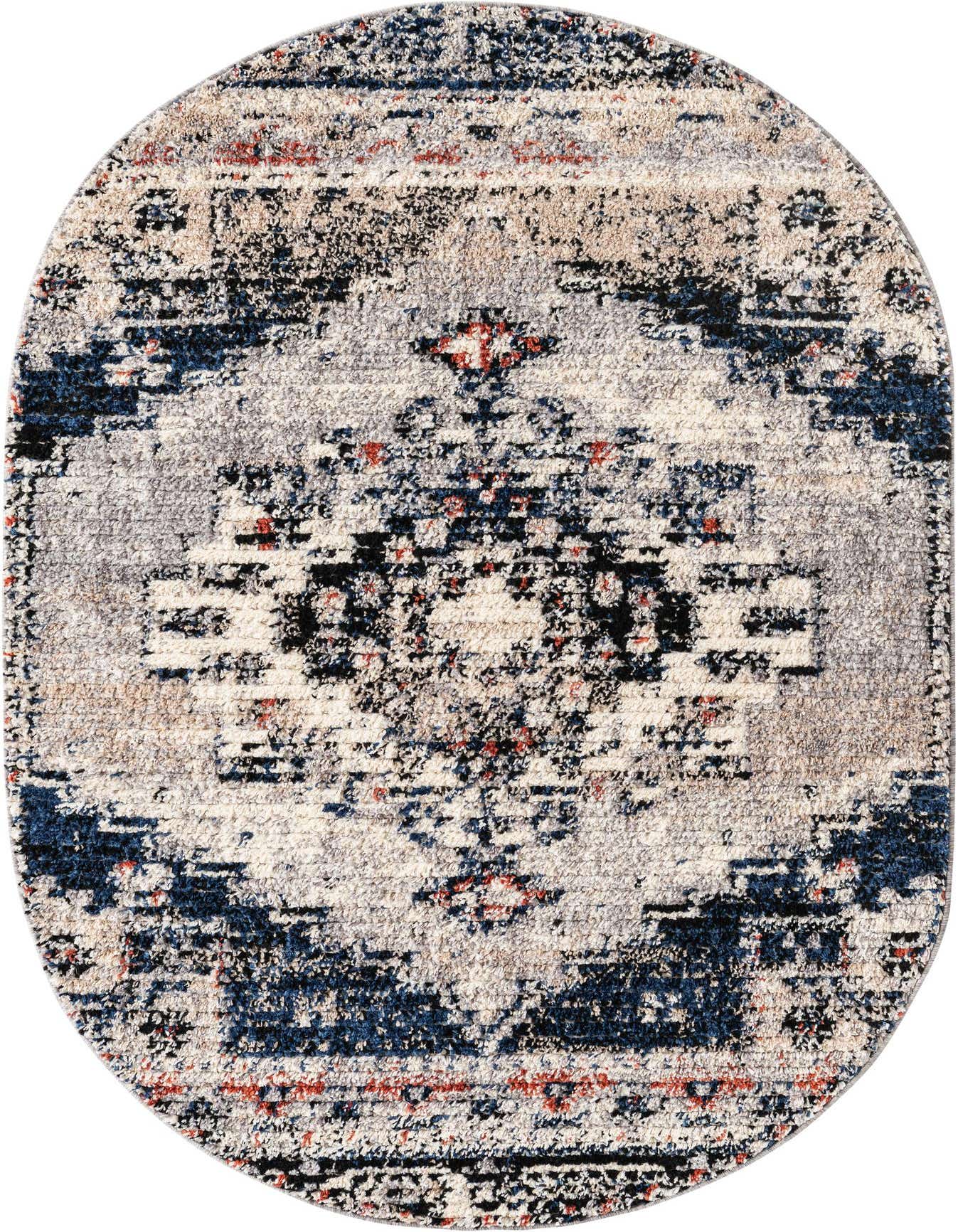 An oval 4' x 6' gray shag rug with a distressed traditional Southwestern medallion pattern in blues, reds, and black.