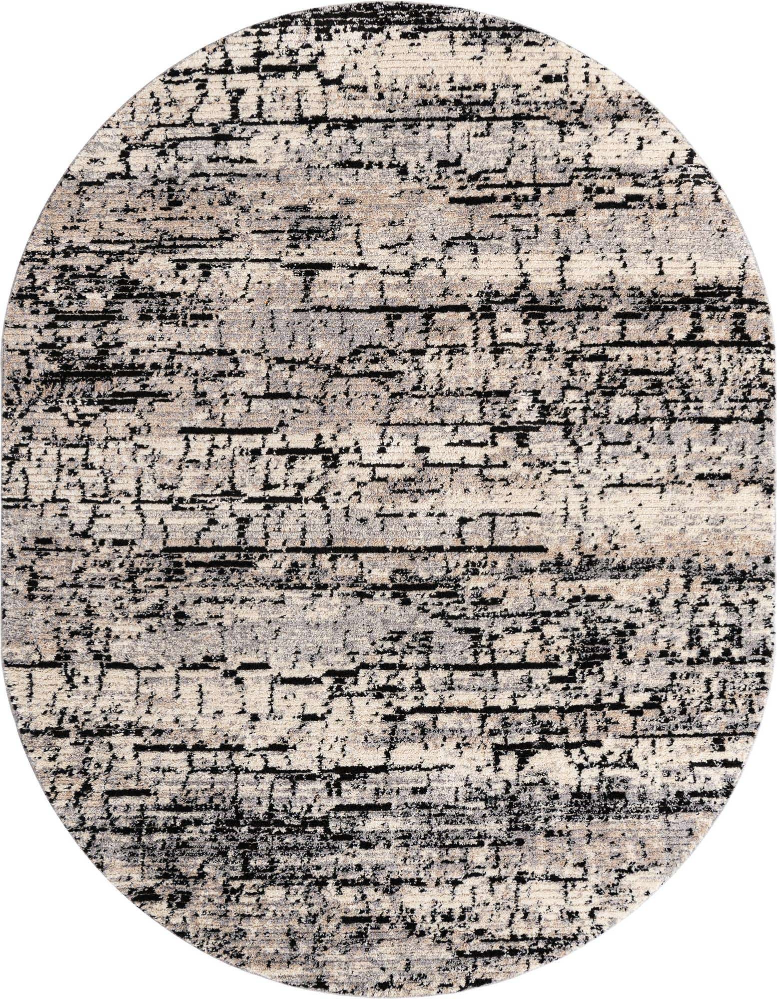 An 8' x 10' oval gray and silver Southwestern shag rug with a modern stripe pattern.