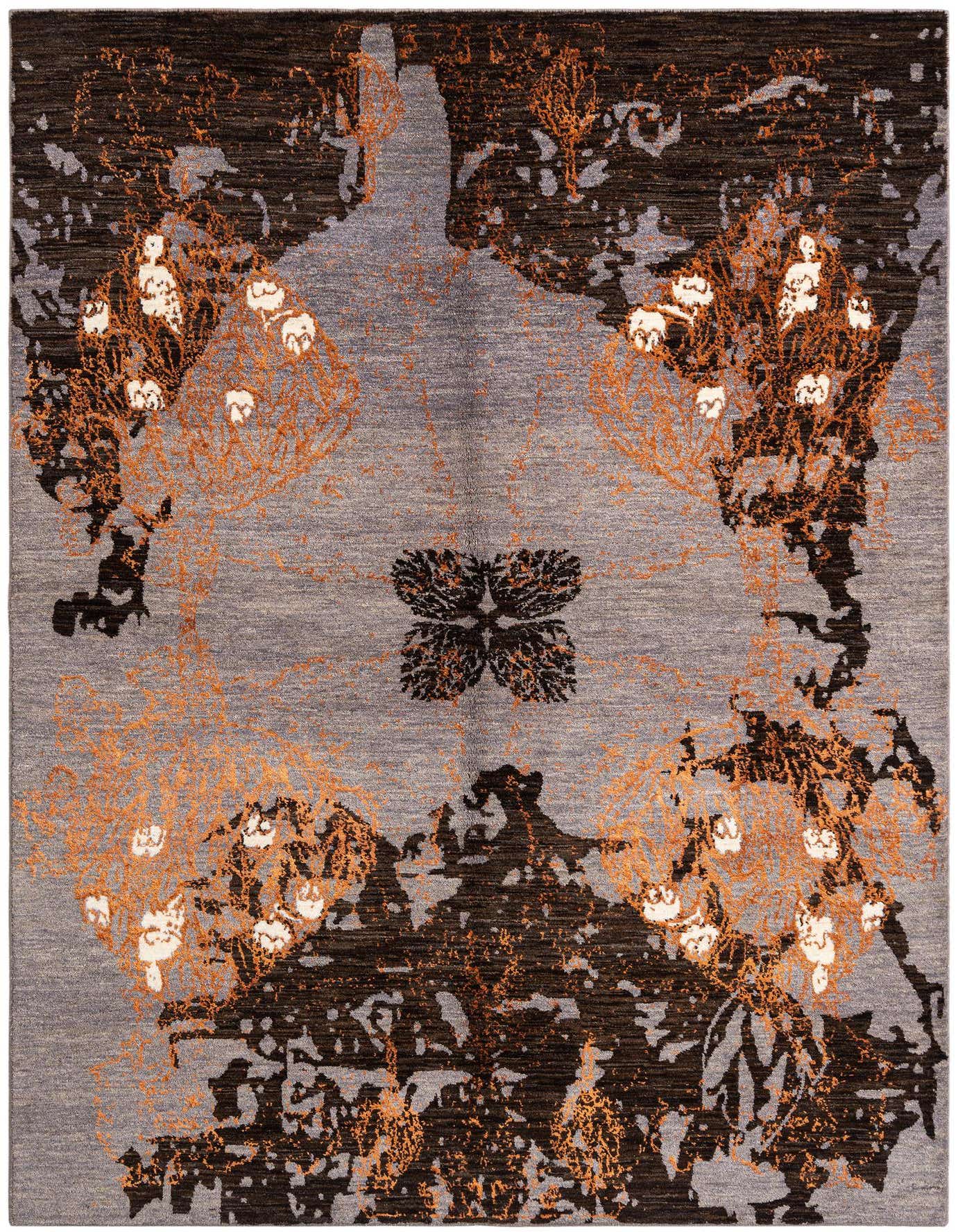 A rectangular gray Persian wool rug with an abstract floral pattern in dark brown, orange, and white.