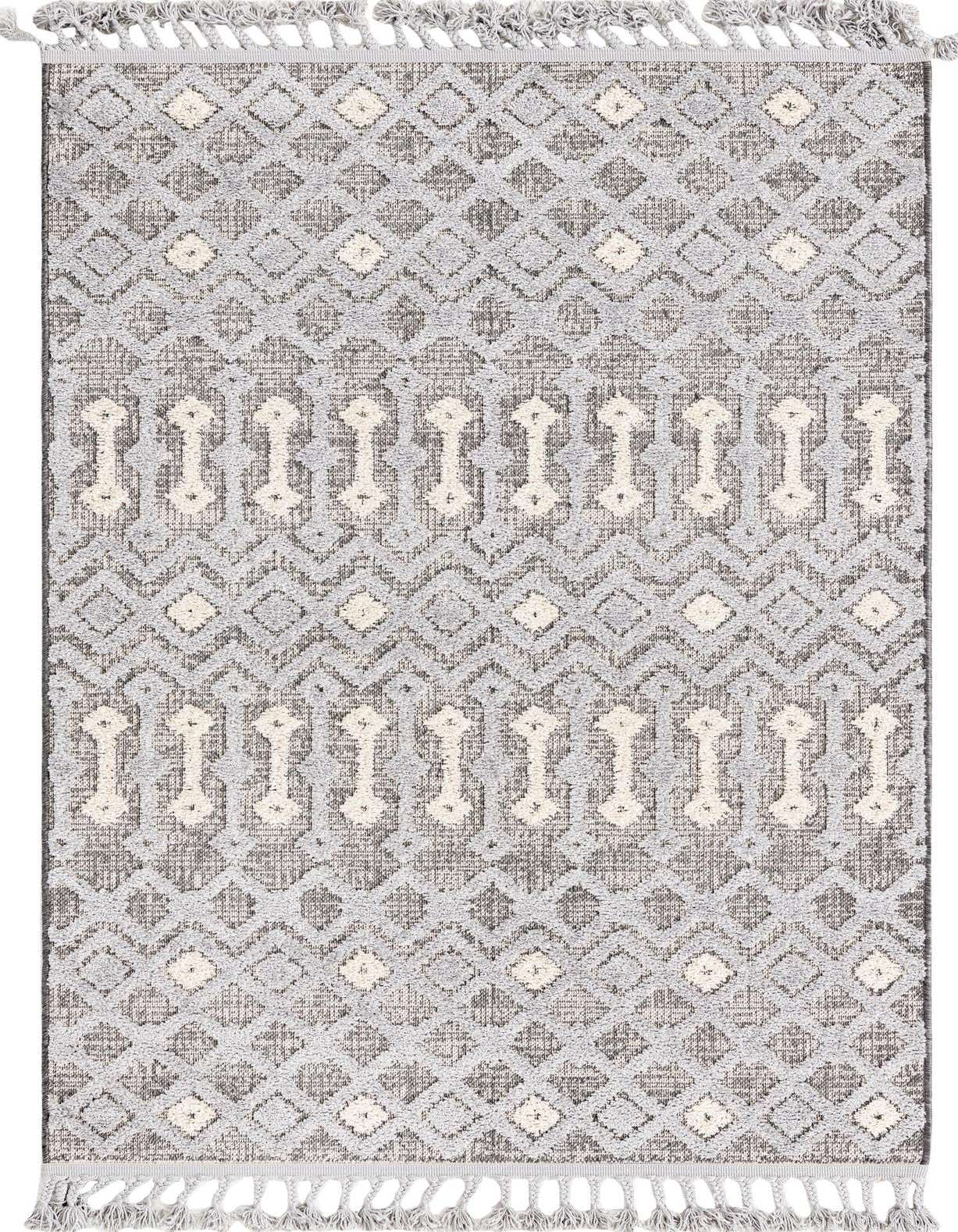A 4x6 rectangular gray tribal rug with a high/low textured pile, featuring abstract geometric patterns and tassels.