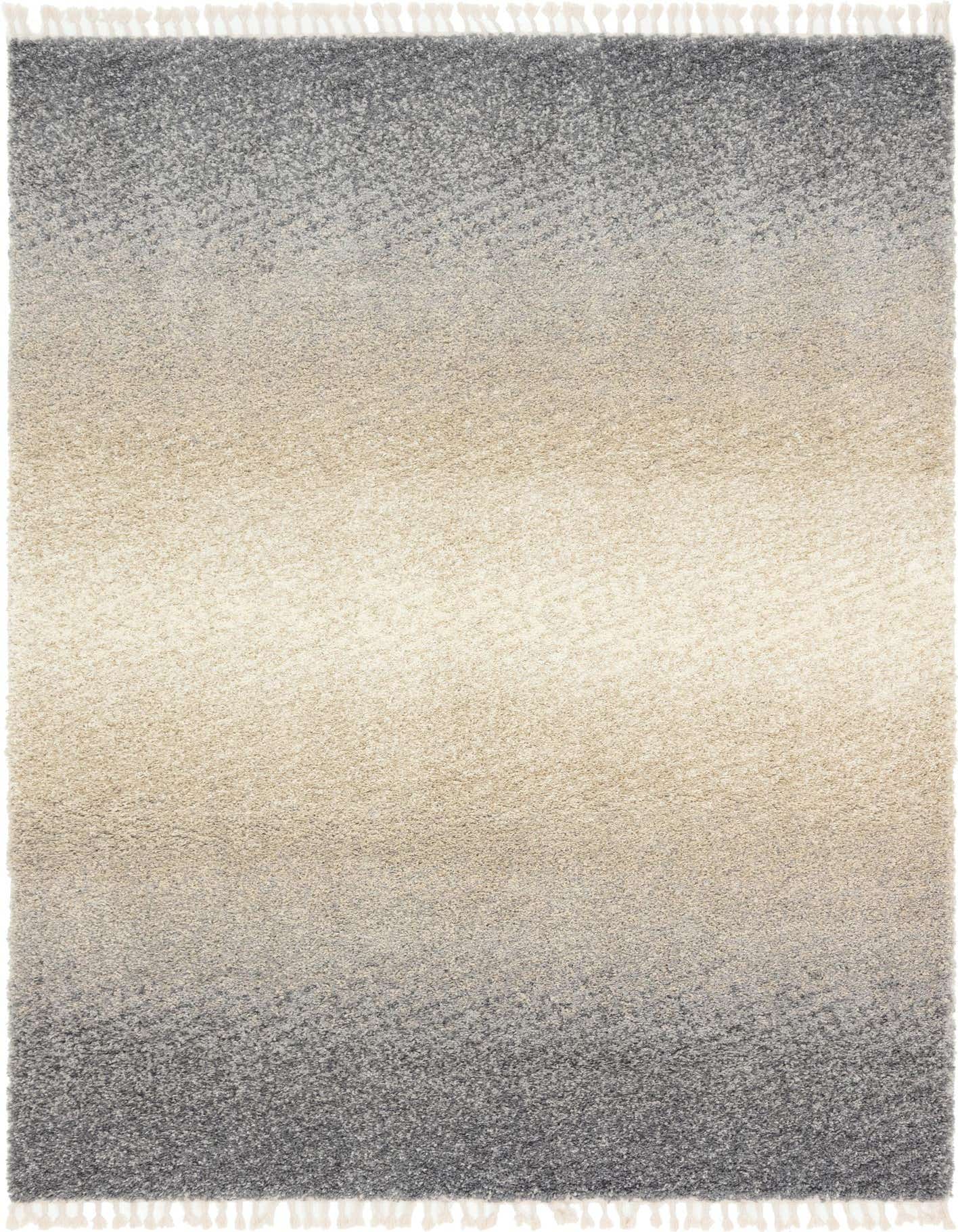 A rectangular 9x12 Athena Shag rug featuring a modern gray and silver ombre design with white tassels.