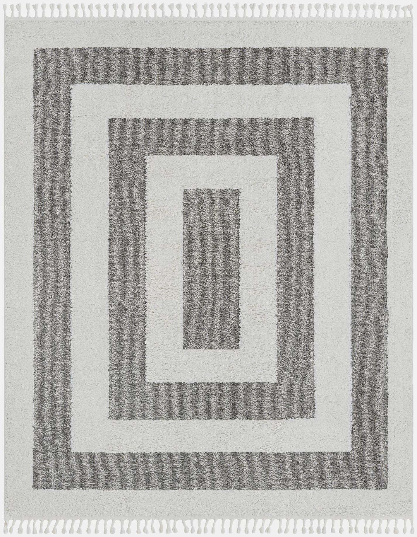 A rectangular 8x10 gray and white modern area rug with a concentric striped pattern and fringed edges.