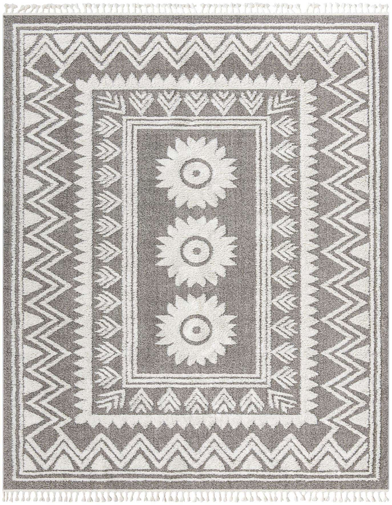 A 10x14 rectangular gray and white Boho rug with a Southwestern tribal pattern, featuring a central medallion of three floral sunbursts and zigzag borders.