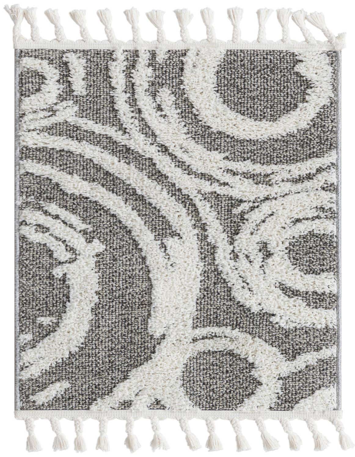 A 2x3 rectangular gray and white bohemian rug with an abstract swirled pattern and decorative tassels.