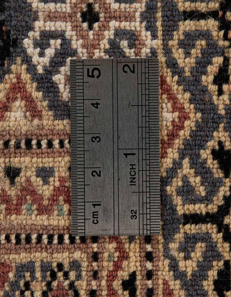 Detail image of  4' 2 x 5' 7  Hand Knotted Bokhara Oriental Rug
