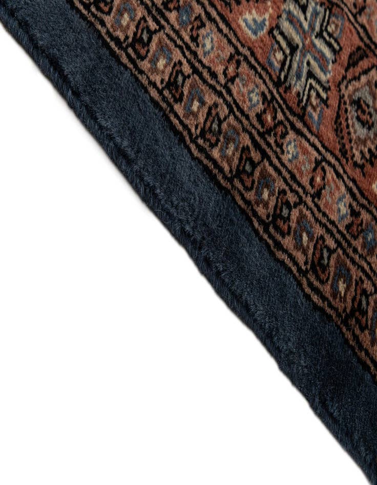 Detail image of  4' 2 x 5' 10  Hand Knotted Bokhara Oriental Wool Rug