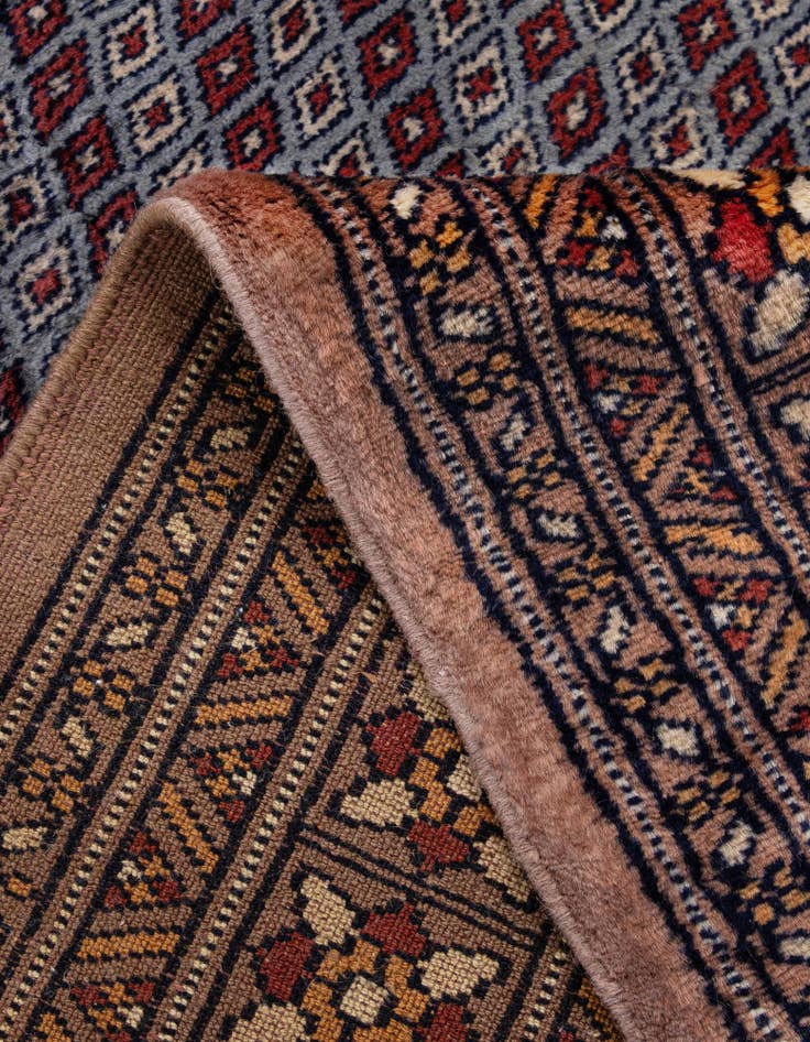 Detail image of  4' 2 x 6' 2  Hand Knotted Bokhara Oriental Wool Rug