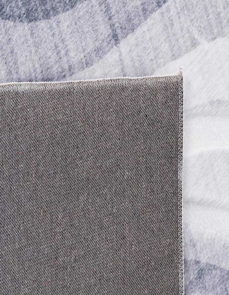 Detail image of  5' 1 x 7' 1 Carved Solid Rabbit Rug