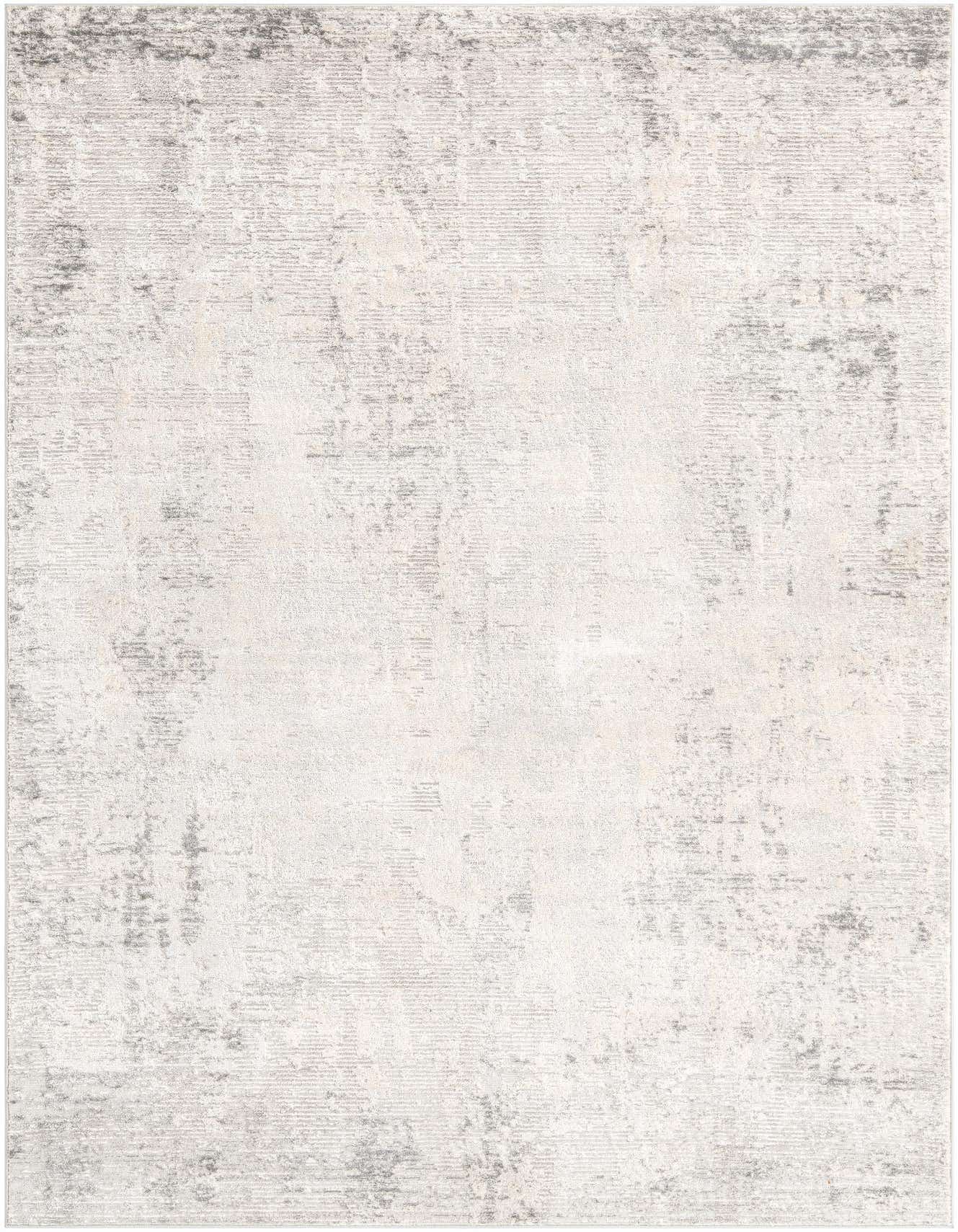 A 6x9 rectangular Rugs.com Caspian rug featuring an abstract, industrial pattern in varying shades of gray and silver.