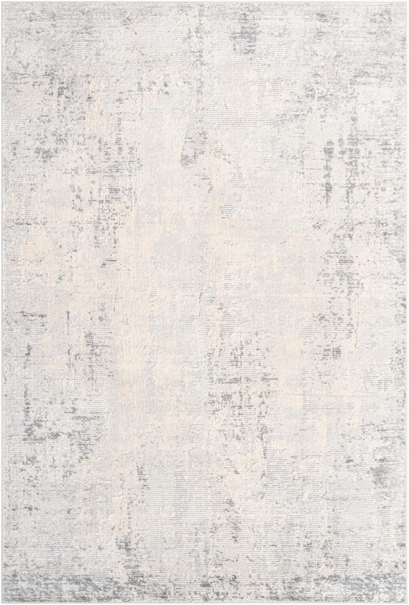 A 7x10 rectangular Rugs.com Caspian rug featuring an abstract, distressed pattern in various shades of gray and silver.
