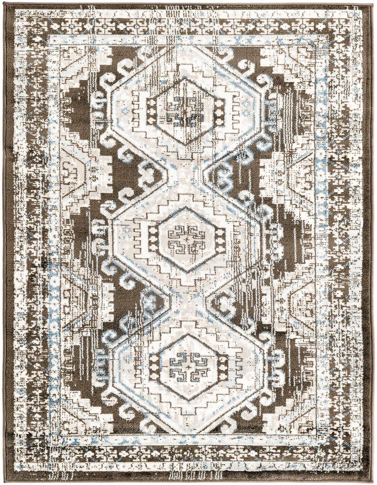 A 3x5 rectangular Charlotte rug featuring a distressed traditional tribal pattern in grays, silvers, and hints of blue.
