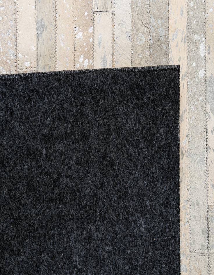 Detail image of  5' 2 x 7' 11 Cowhide - Patchwork Rug