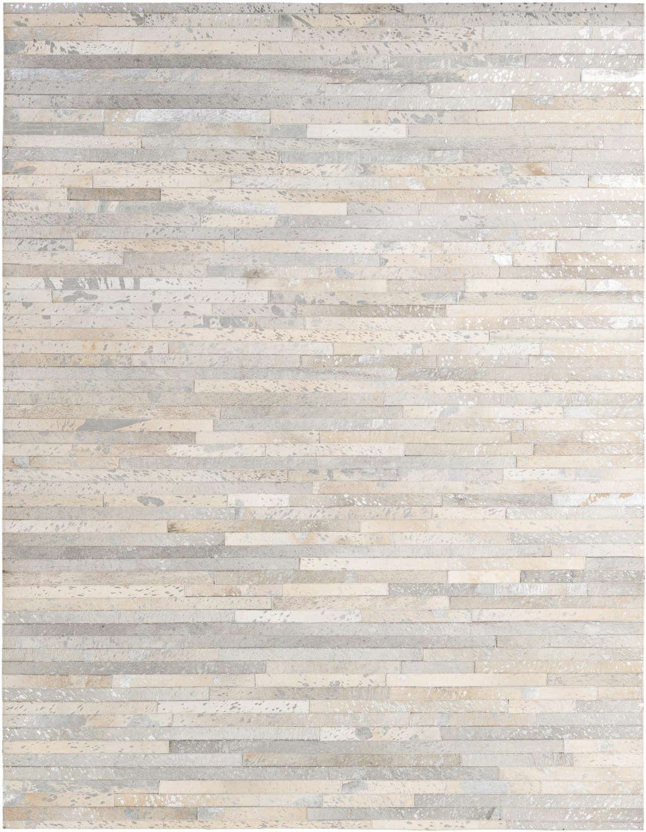 A 5x8 rectangular Cowhide - Patchwork rug featuring a modern stripe pattern in grays and silvers, suitable for various indoor rooms.