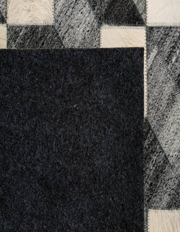 Detail image of  4' 11 x 7' 9 Cowhide - Patchwork Rug