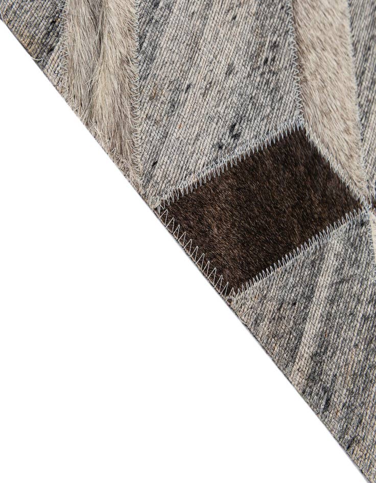 Detail image of  5' 1 x 8' 2 Cowhide - Patchwork Rug