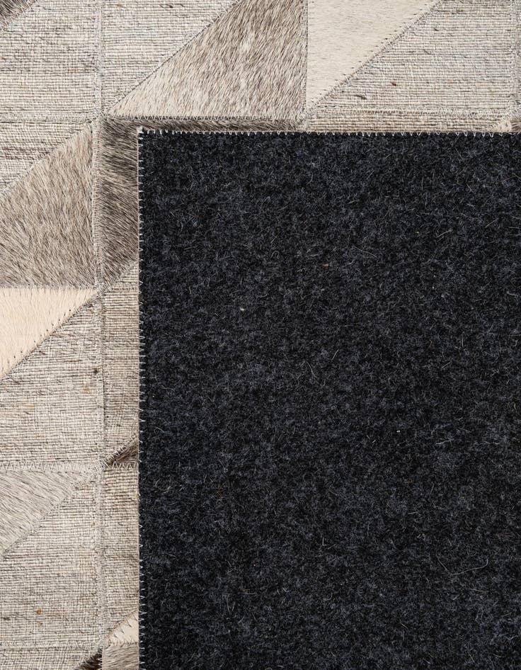 Detail image of  4' 10 x 7' 8 Cowhide - Patchwork Rug