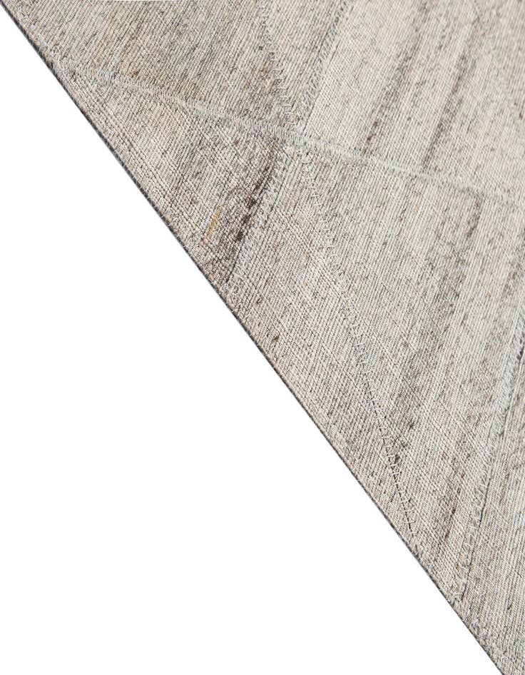 Detail image of  4' 11 x 7' 11 Cowhide - Patchwork Rug
