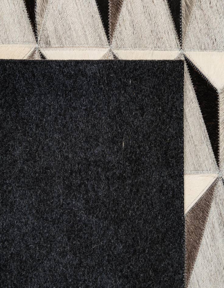 Detail image of  4' 11 x 7' 11 Cowhide - Patchwork Rug