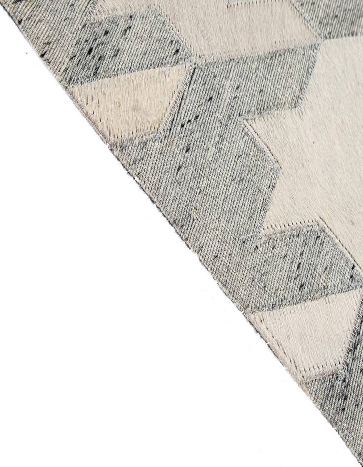 Detail image of  5' 1 x 7' 11 Cowhide - Patchwork Rug