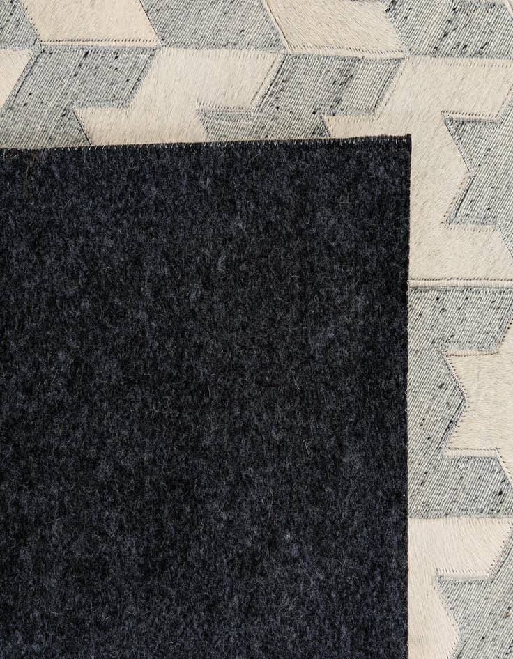 Detail image of  5' 1 x 7' 11 Cowhide - Patchwork Rug