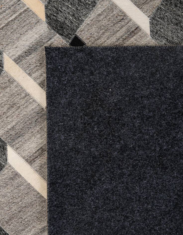 Detail image of  5' 2 x 7' 11 Cowhide - Patchwork Rug