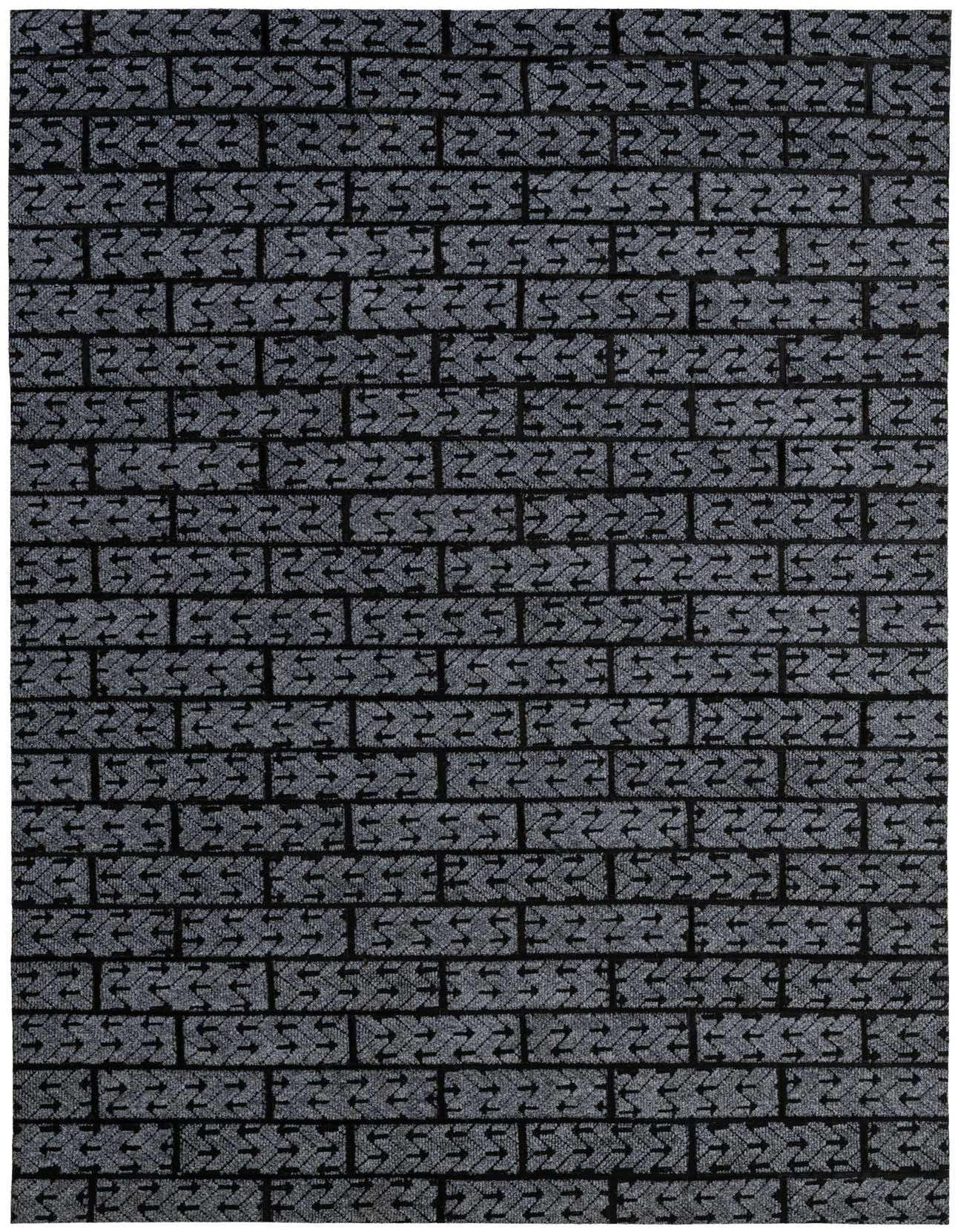 A 5x8 rectangular Cowhide - Patchwork rug in shades of gray and silver, featuring a modern, abstract brick-like pattern with arrows.