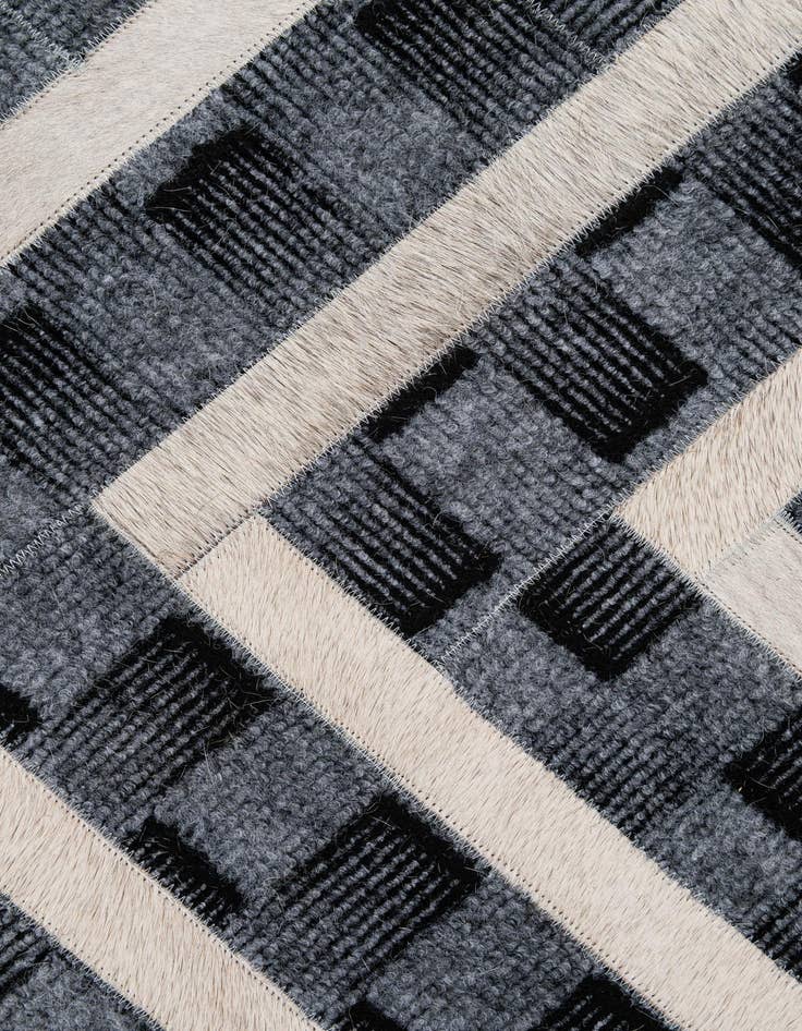 Detail image of  4' 11 x 7' 11 Cowhide - Patchwork Rug