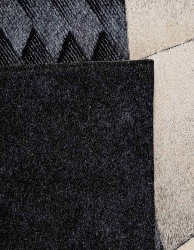 Detail image of  4' 11 x 8' 1 Cowhide - Patchwork Rug