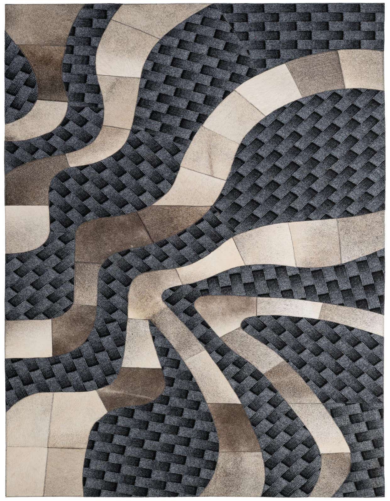 A 5x8 rectangular modern rug featuring an abstract pattern of dark gray woven texture and light gray, beige, and brown cowhide patches.