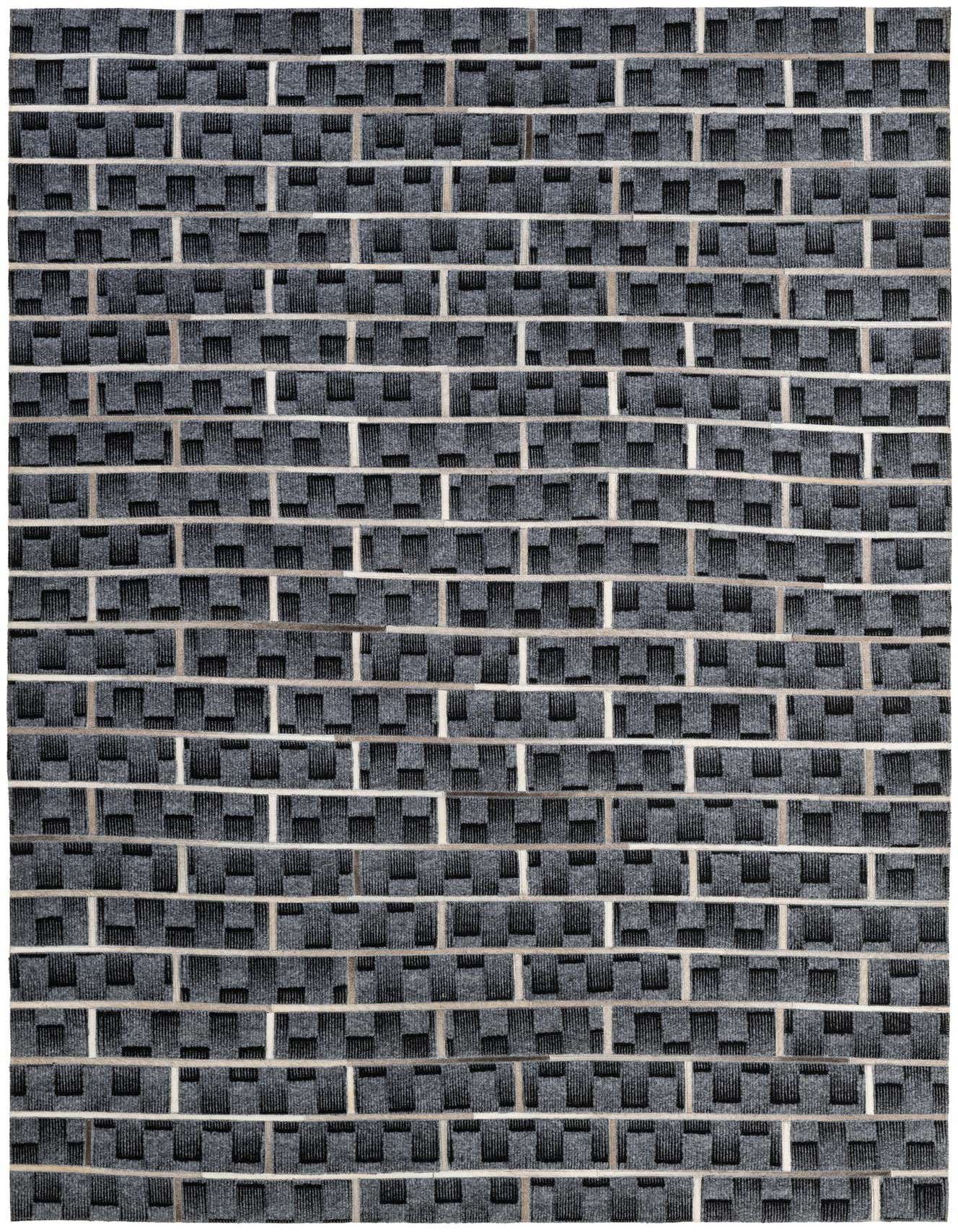 A 5x8 rectangular gray modern rug with a patchwork stripe pattern, made from cowhide and leather.